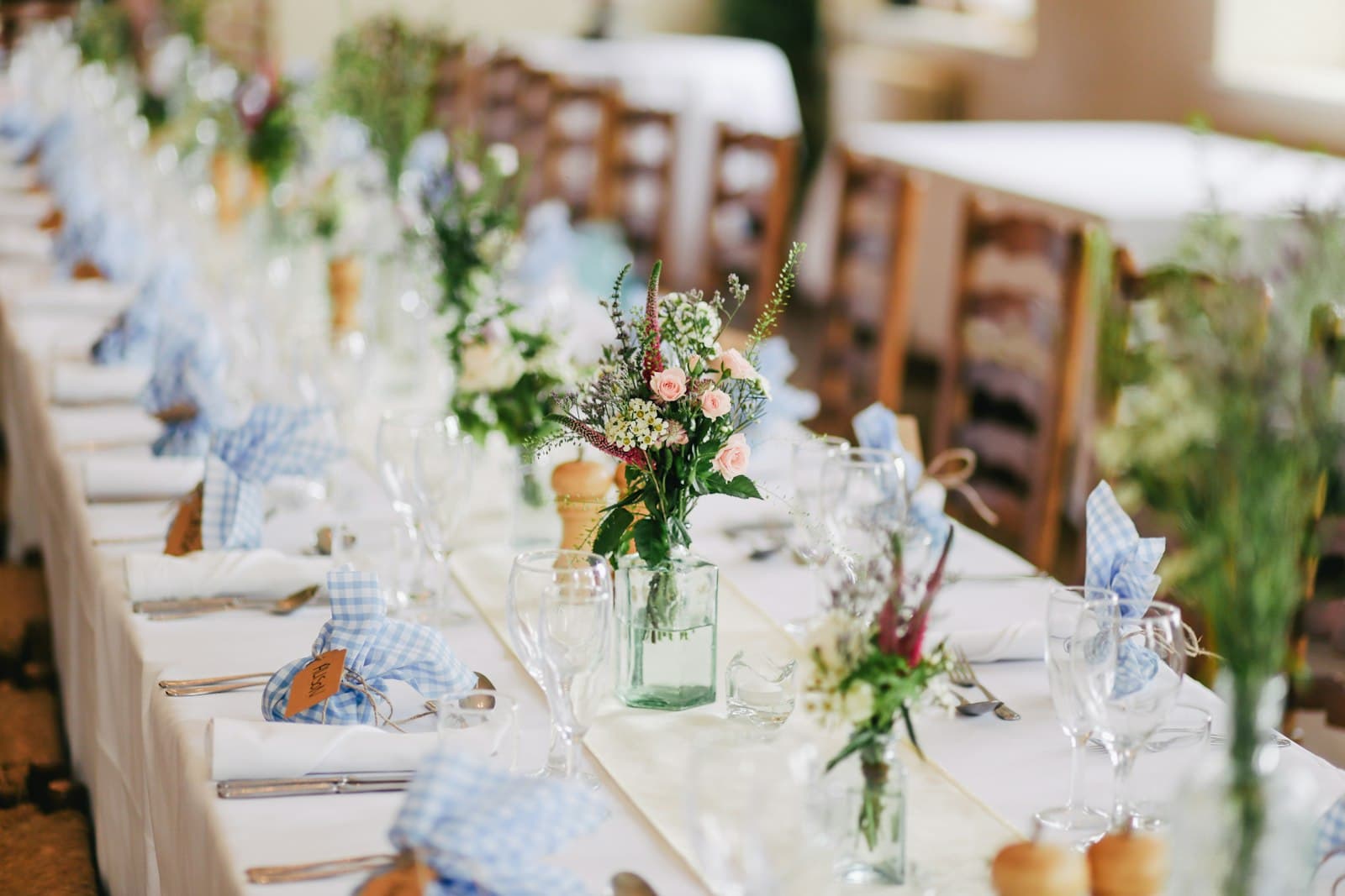 A candlelit garden dinner set for a celebration